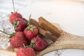 Chocolate with fresh berries on wooden table Royalty Free Stock Photo