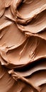 Chocolate frosting texture showcases smooth swirls and rich color ideal for desserts.