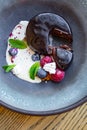 Chocolate fudge mousse cake with ice cream,berries Royalty Free Stock Photo