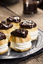 Chocolate Ganache Covered Profiteroles or Cream Puffs