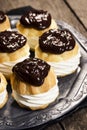 Chocolate Ganache Topped Creampuffs or Profiteroles Royalty Free Stock Photo