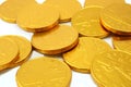 Chocolate gold coins, randomly scattered Royalty Free Stock Photo