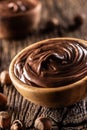 Chocolate hazelnut spread in wooden bowl - Close up Royalty Free Stock Photo