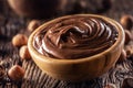 Chocolate hazelnut spread in wooden bowl - Close up Royalty Free Stock Photo