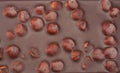 chocolate with hazelnuts background. chocolate with hazelnuts texture. Royalty Free Stock Photo