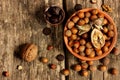 Chocolate and hazelnuts on a wooden background Royalty Free Stock Photo