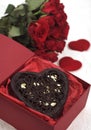 Chocolate Heart and Red Roses, Present for Valentine`s Day Royalty Free Stock Photo
