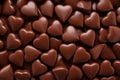 Chocolate heart shaped candy texture. Sweet chocolate hearts background. Generative AI