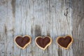 Chocolate heart on wooden background for gift in Valentine`s day love. Royalty Free Stock Photo