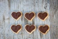 Chocolate heart on wooden background for gift in Valentine`s day love. Royalty Free Stock Photo