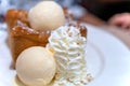 Chocolate honey toast with ice cream on white dish