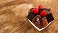 Chocolate ice cream in a bowl. Dessert decorated with chocolate and strawberries Royalty Free Stock Photo