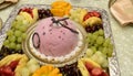 Chocolate Ice Cream Cake. Decorated with fruits. Kiwi Pineapple. Mango Royalty Free Stock Photo