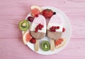 Chocolate ice cream, fruit, plate berries dairy snack fresh gastronomy on a pink wooden