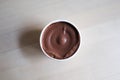 Chocolate ice cream in paper cup Royalty Free Stock Photo