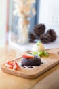 Chocolate lava cake with vanilla ice cream and strawberry