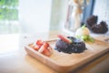 Chocolate lava cake with vanilla ice cream and strawberry