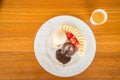 Chocolate lava cake with vanilla icecream, strawberry and banana Royalty Free Stock Photo