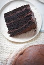 Chocolate layered cake. Dark chocolate cake made on buttermilk and cola