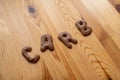 Chocolate letter cookies, written carb