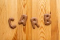Chocolate letter cookies, written carb