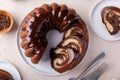 Chocolate marble bundt cake with chocolate glaze drizzled on top Royalty Free Stock Photo