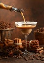 Chocolate martini cocktail or Irish cream liquor is poured from a bottle into a glass Royalty Free Stock Photo