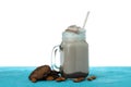 Chocolate milkshake, cookies and almond on blue textured table isolated on white background Royalty Free Stock Photo