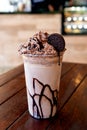 Chocolate milkshake with cream and oreo biscuits