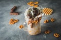 Chocolate milkshake with dripping sauce, cream, cake and cookie Royalty Free Stock Photo