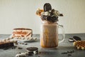 Chocolate milkshake with dripping sauce, cream, marshmallow, cookies and cake Royalty Free Stock Photo