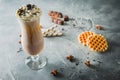 Chocolate milkshake with whipped cream and chocolate. Sweet drink and cookies Royalty Free Stock Photo