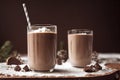 Chocolate Milkshakes with whipped cream topping and straw and chocolate chips Royalty Free Stock Photo
