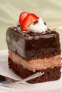 Chocolate mousse cake with cut strawberries Royalty Free Stock Photo