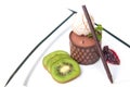 chocolate mousse presented with a scoop of ice cream and natural kiwi Royalty Free Stock Photo
