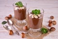 Chocolate mousse pudding with hazelnuts. Close-up. Royalty Free Stock Photo