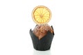 Chocolate muffin with orange slice isolated on white background Royalty Free Stock Photo