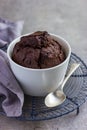 Chocolate muffin in white ramekin