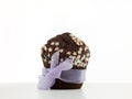 Chocolate muffin wrapped up as a gift Royalty Free Stock Photo
