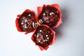 Chocolate muffins in red paper with the inscription love