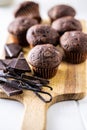 Chocolate muffins. Sweet dark cupcakes with chocolate and vanilla pods Royalty Free Stock Photo