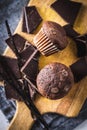 Chocolate muffins. Sweet dark cupcakes with chocolate and vanilla pods Royalty Free Stock Photo