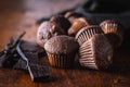 Chocolate muffins. Sweet dark cupcakes with chocolate and vanilla pods Royalty Free Stock Photo