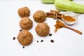 Chocolate muffins with zucchini and banana. wet veggie cupcakes home-made, top view on a light background. cooking muffins in the