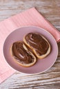 Chocolate-nut cream spread on slices of bread. Royalty Free Stock Photo