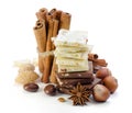 Chocolate, nuts, cinnamon and anise. Spices. Royalty Free Stock Photo