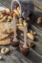 chocolate and nuts on wooden background