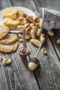 chocolate and nuts on wooden background