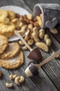 chocolate and nuts on wooden background