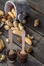 chocolate and nuts on wooden background